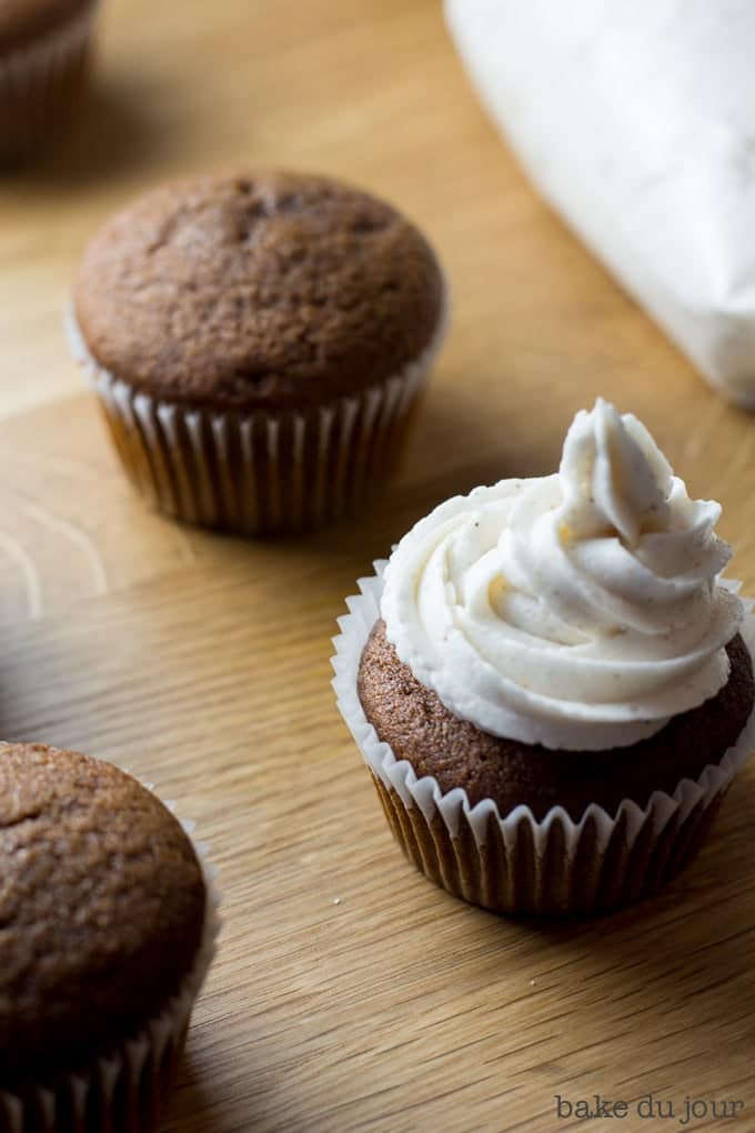 Frosting the Gingerbread Eggnog Cupcakes