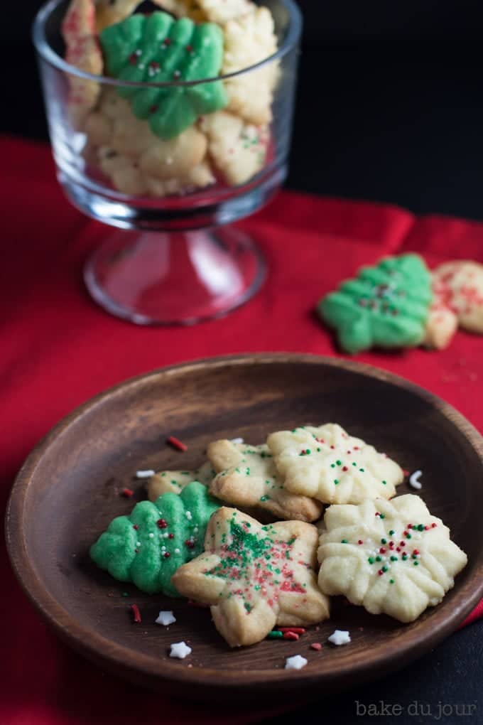 A few Holiday Spritz Cookies on a plate