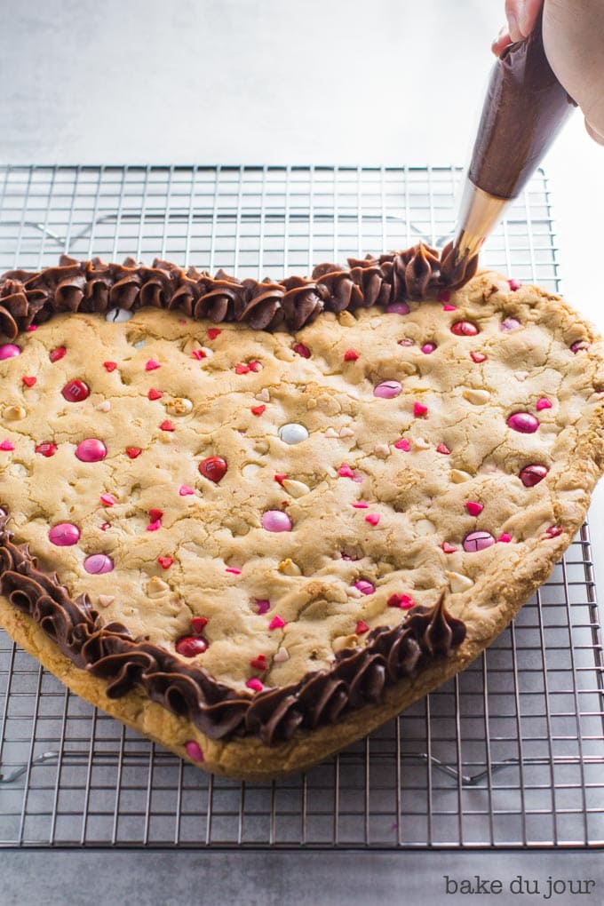 Frosting the Valentine's Day Cookie Cake
