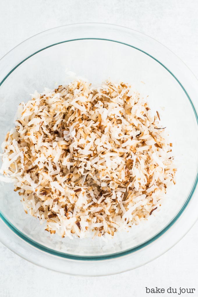 A bowl of toasted coconut flakes